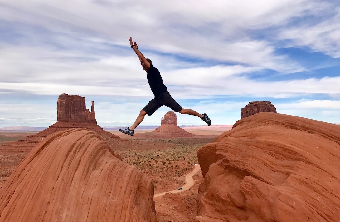 Man jumping on a canyon